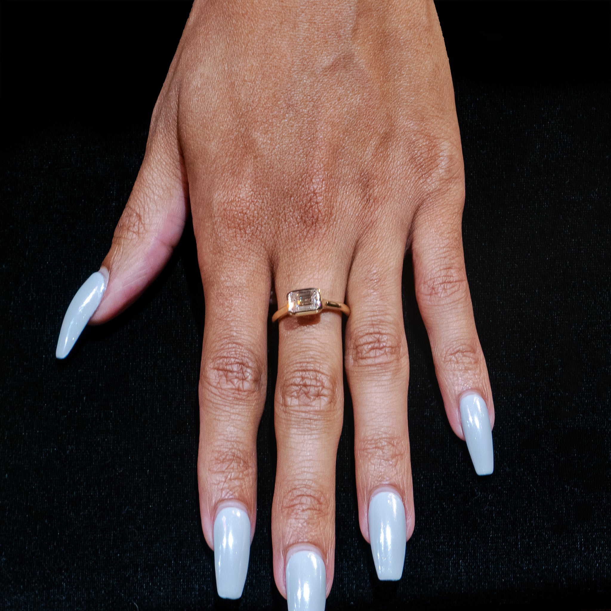 East-West Emerald Cut Diamond Ring