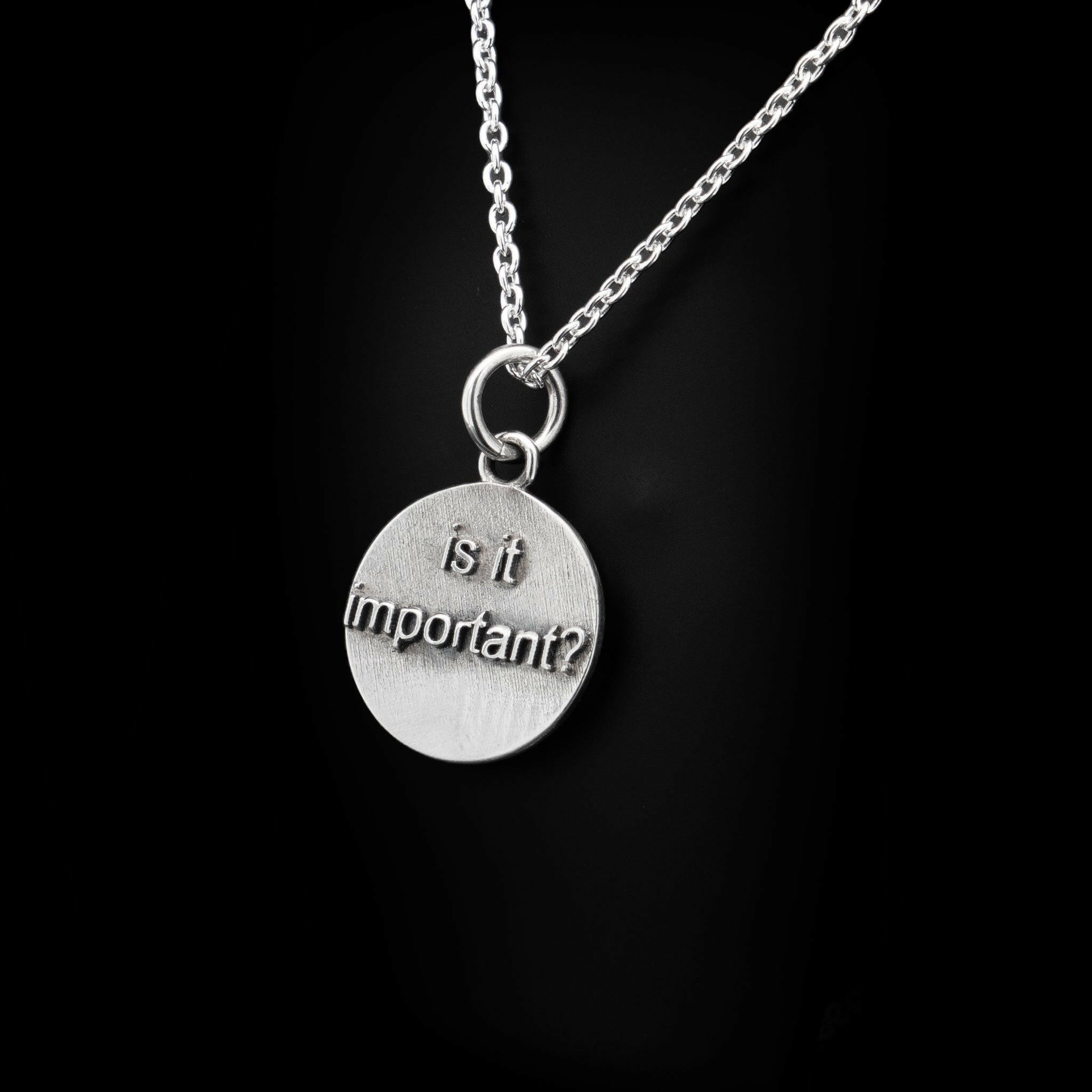 silver word pendant