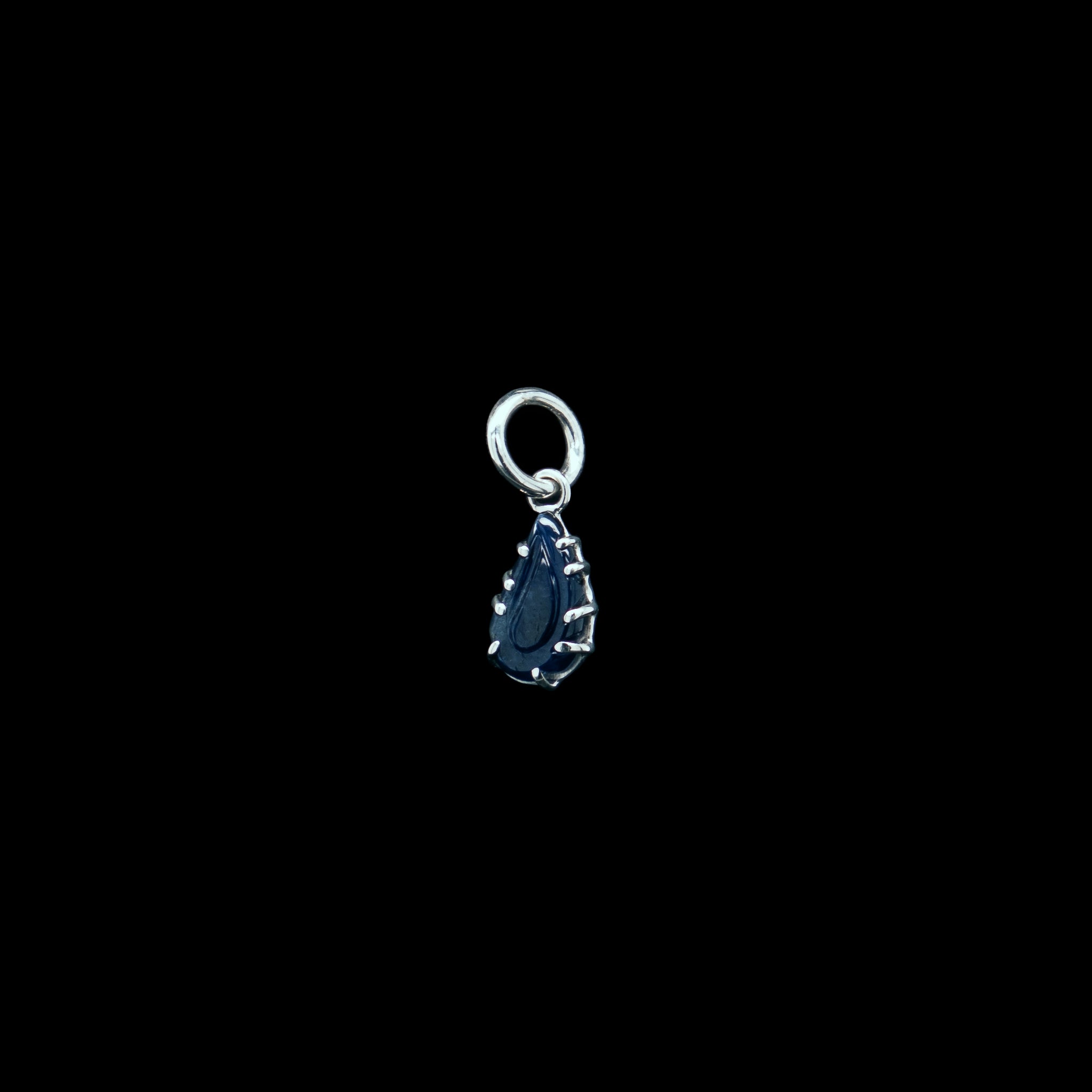 carved sapphire pendant