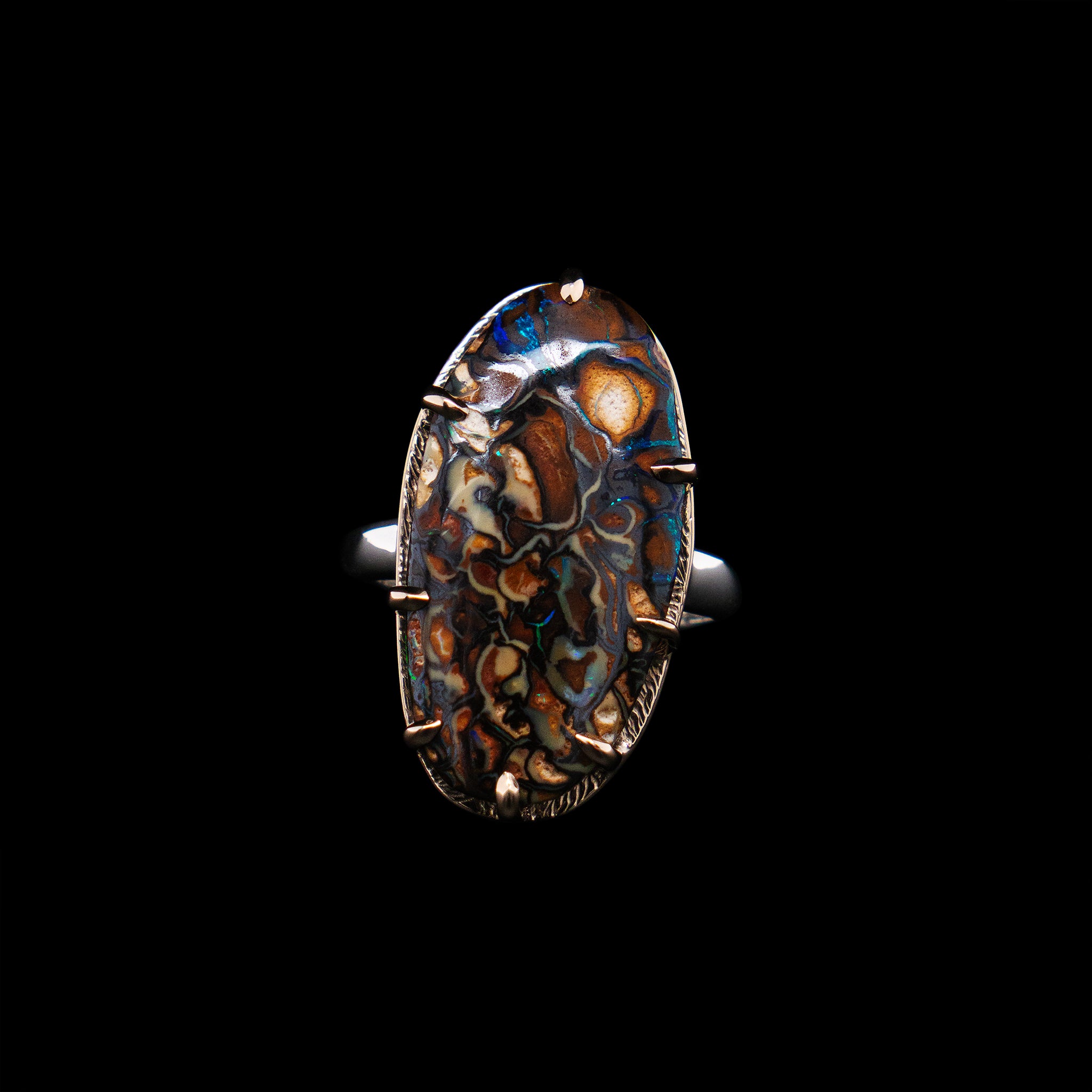 Boulder opal two tone ring
