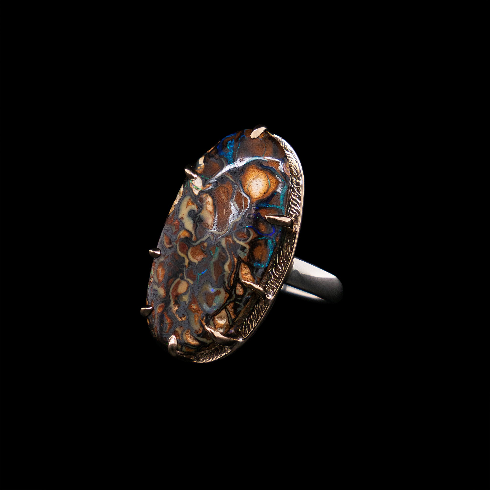 Boulder opal two tone ring