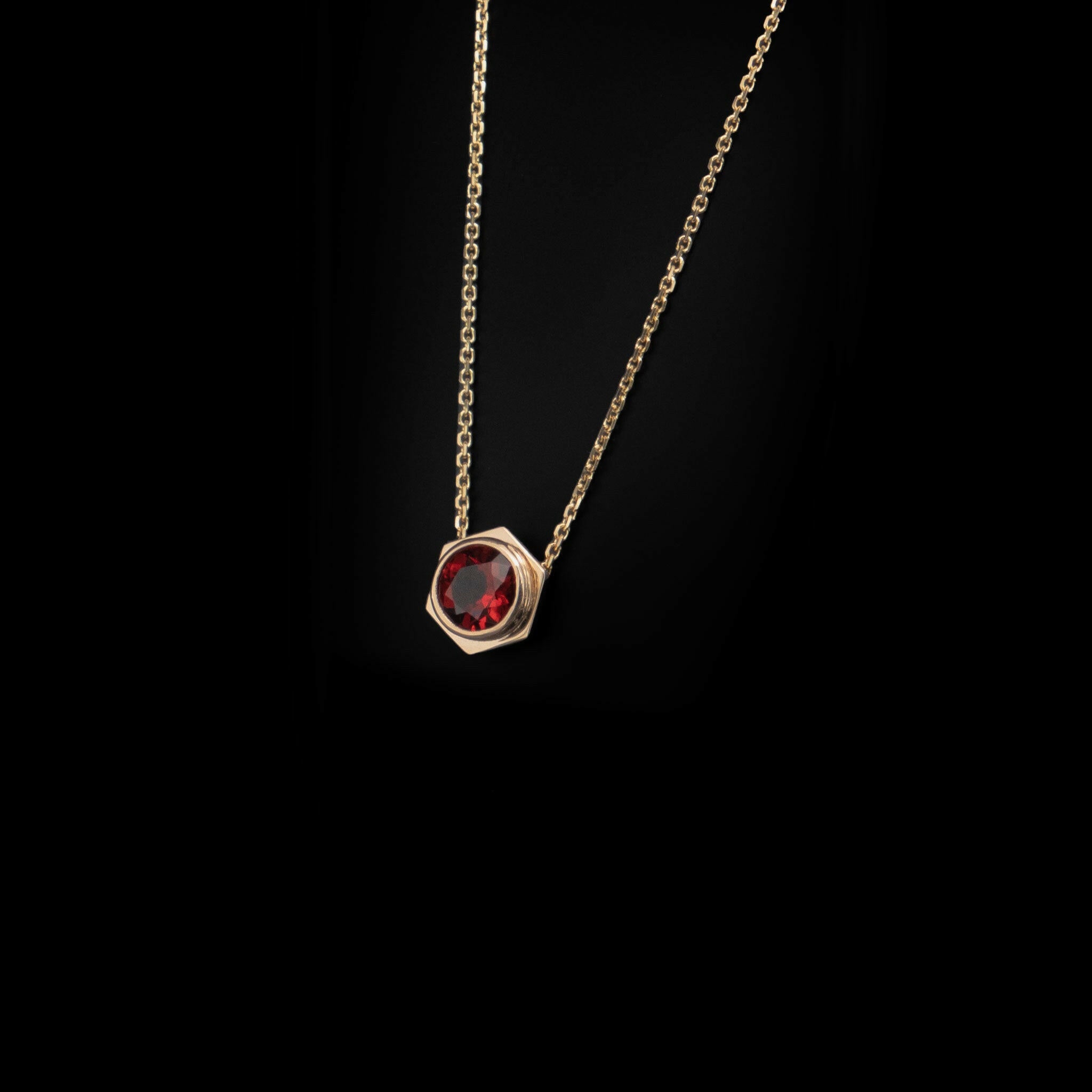 Right front angle of bolt pendant necklace. 1