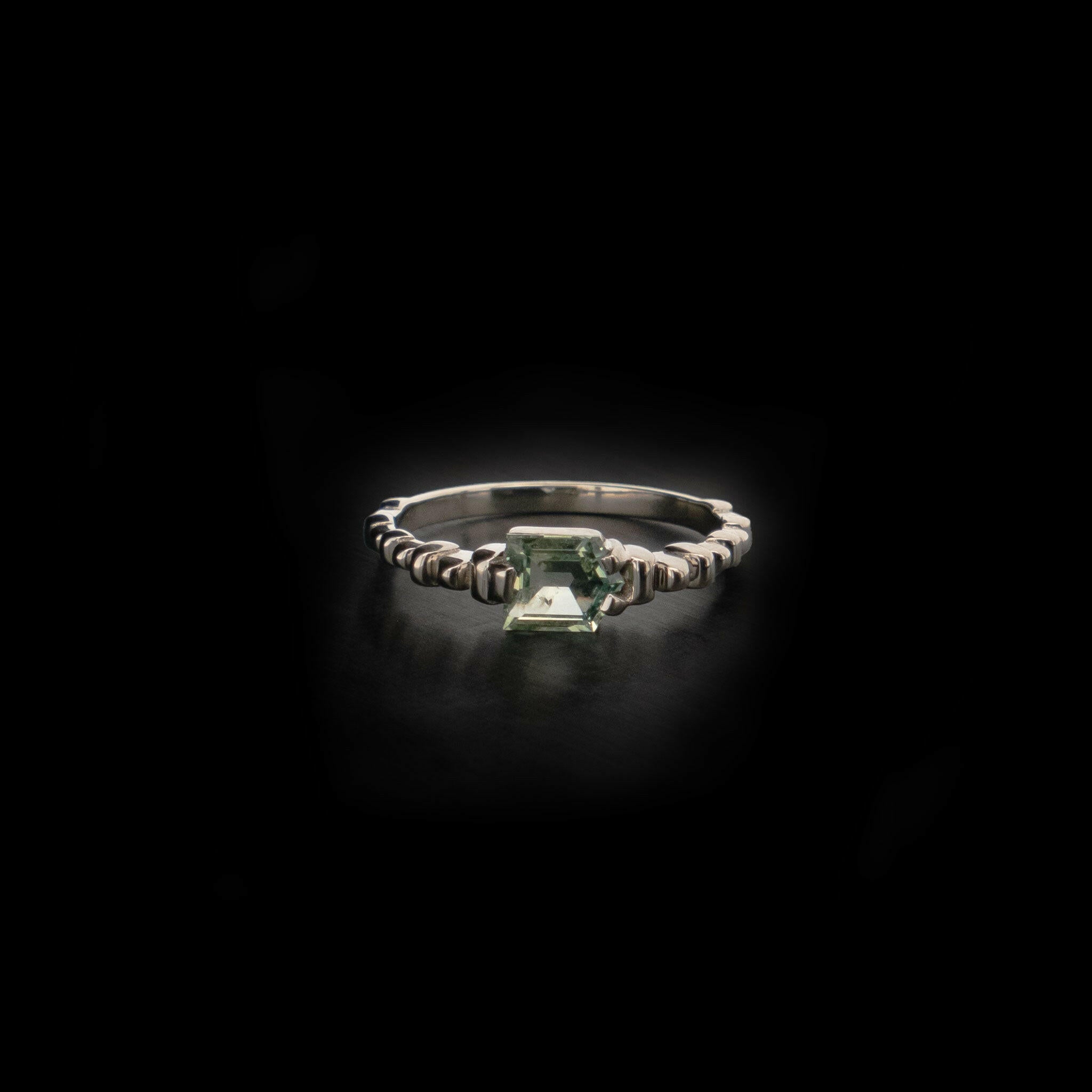 14k white gold ring with light green sapphire