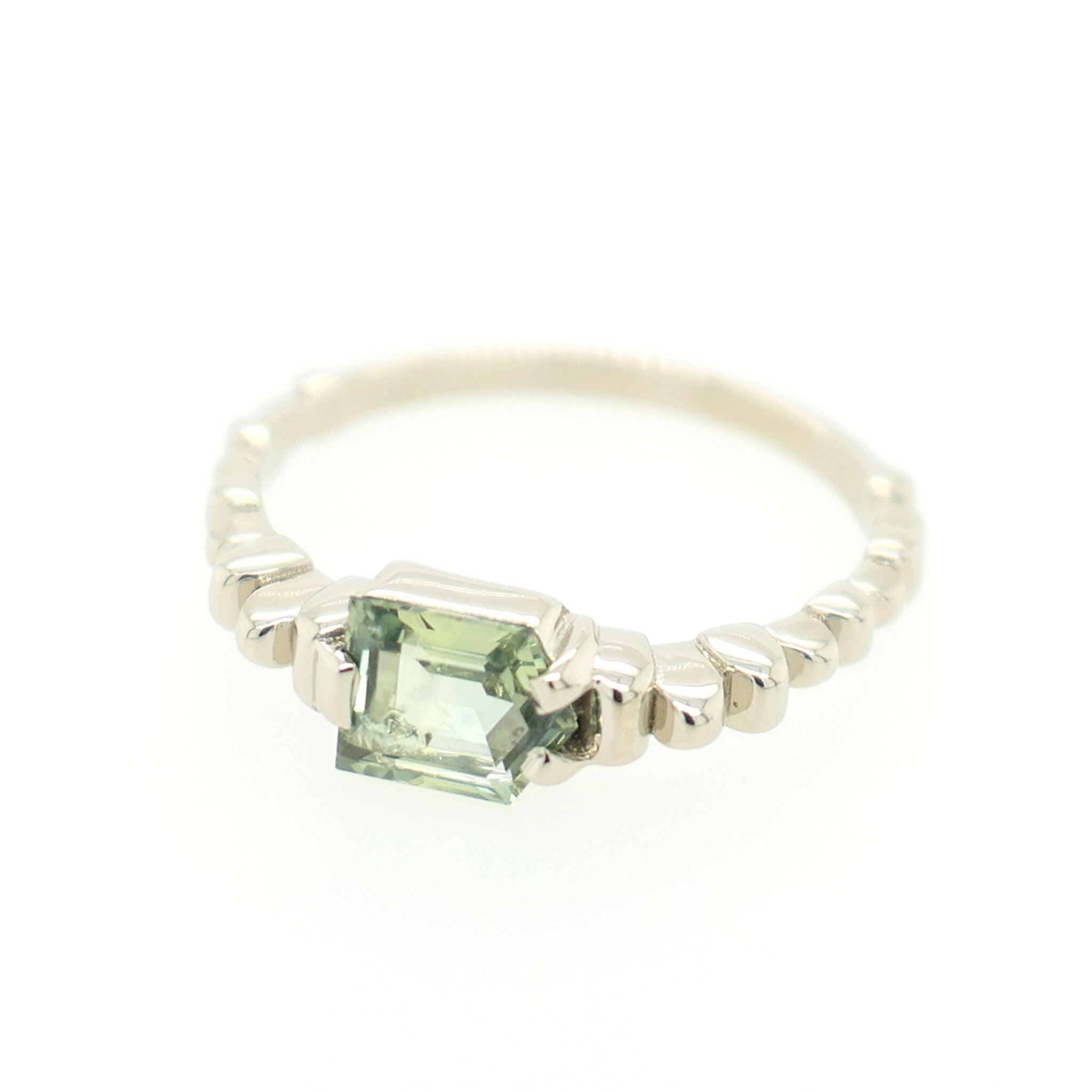green montana sapphire on 14k white gold ring