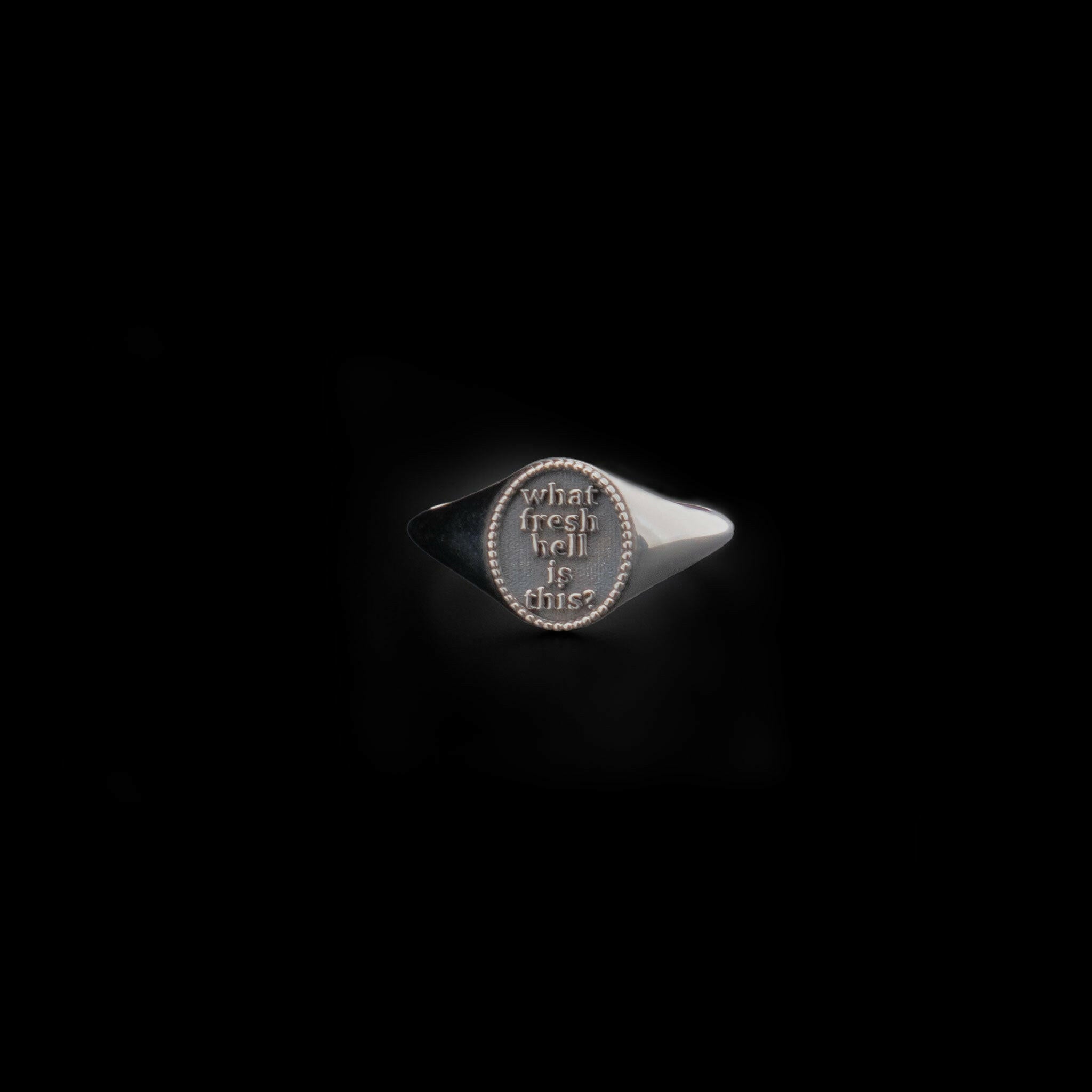 What fresh hell is this silve ring