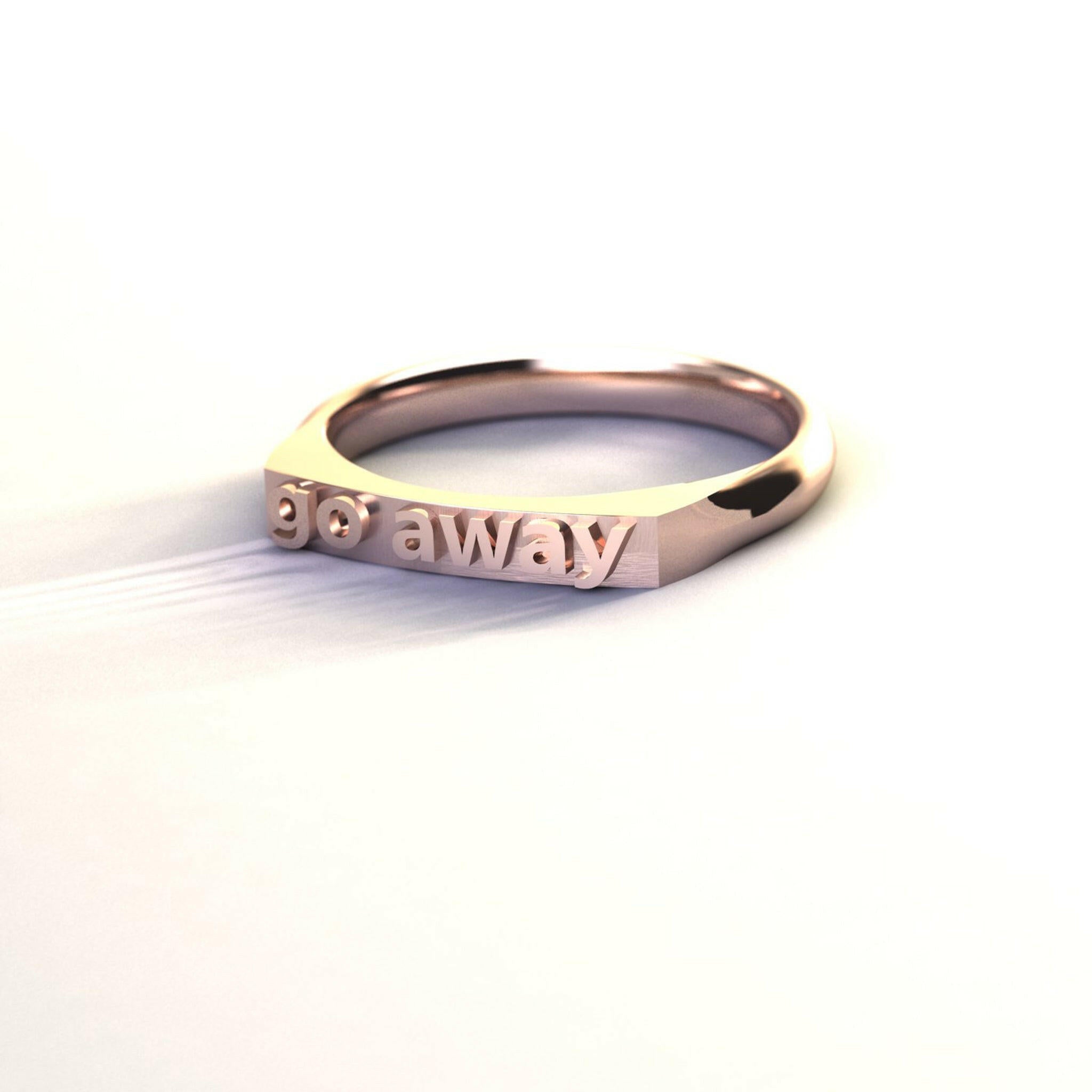 silver ring with text