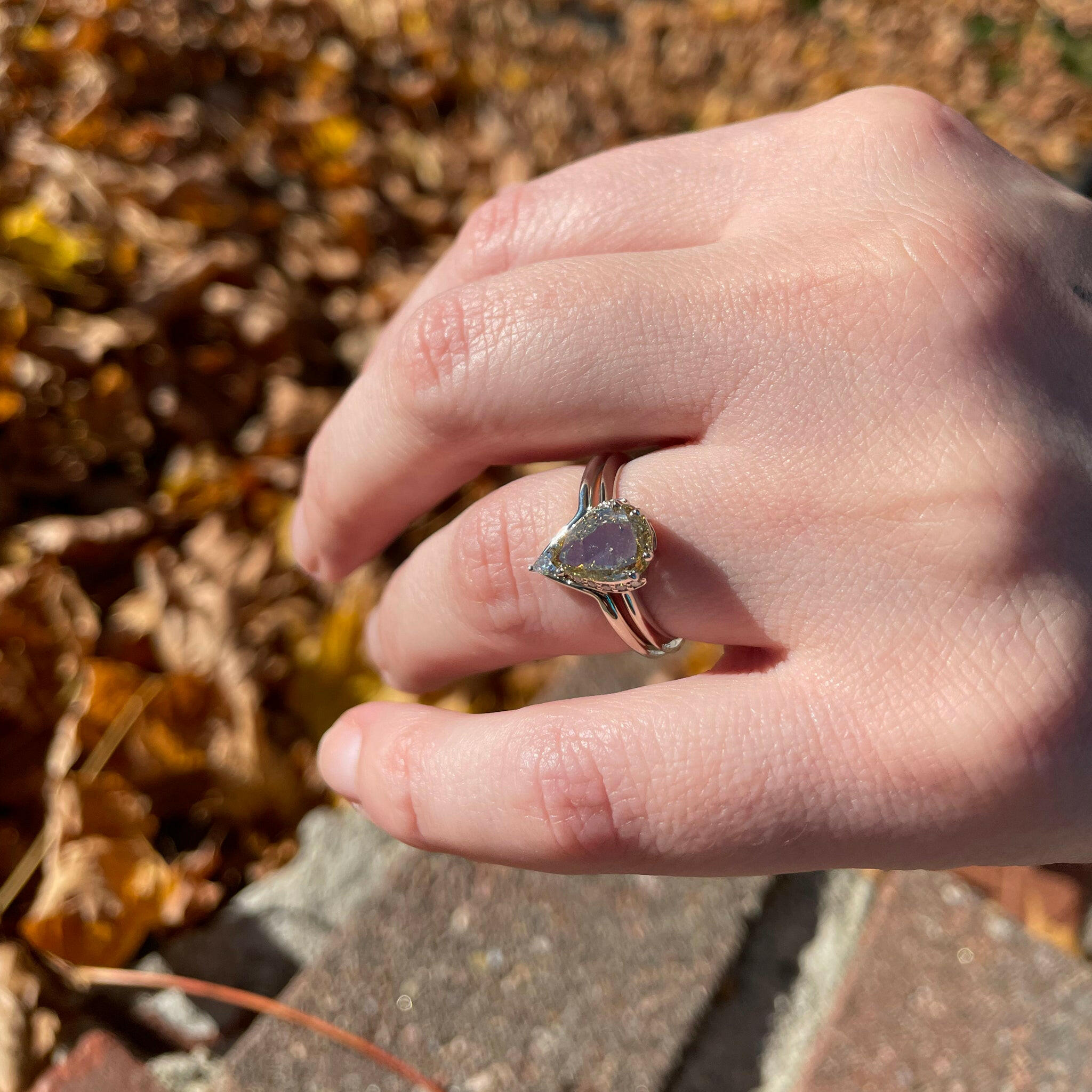 stacked chevron band with gold engagement ring