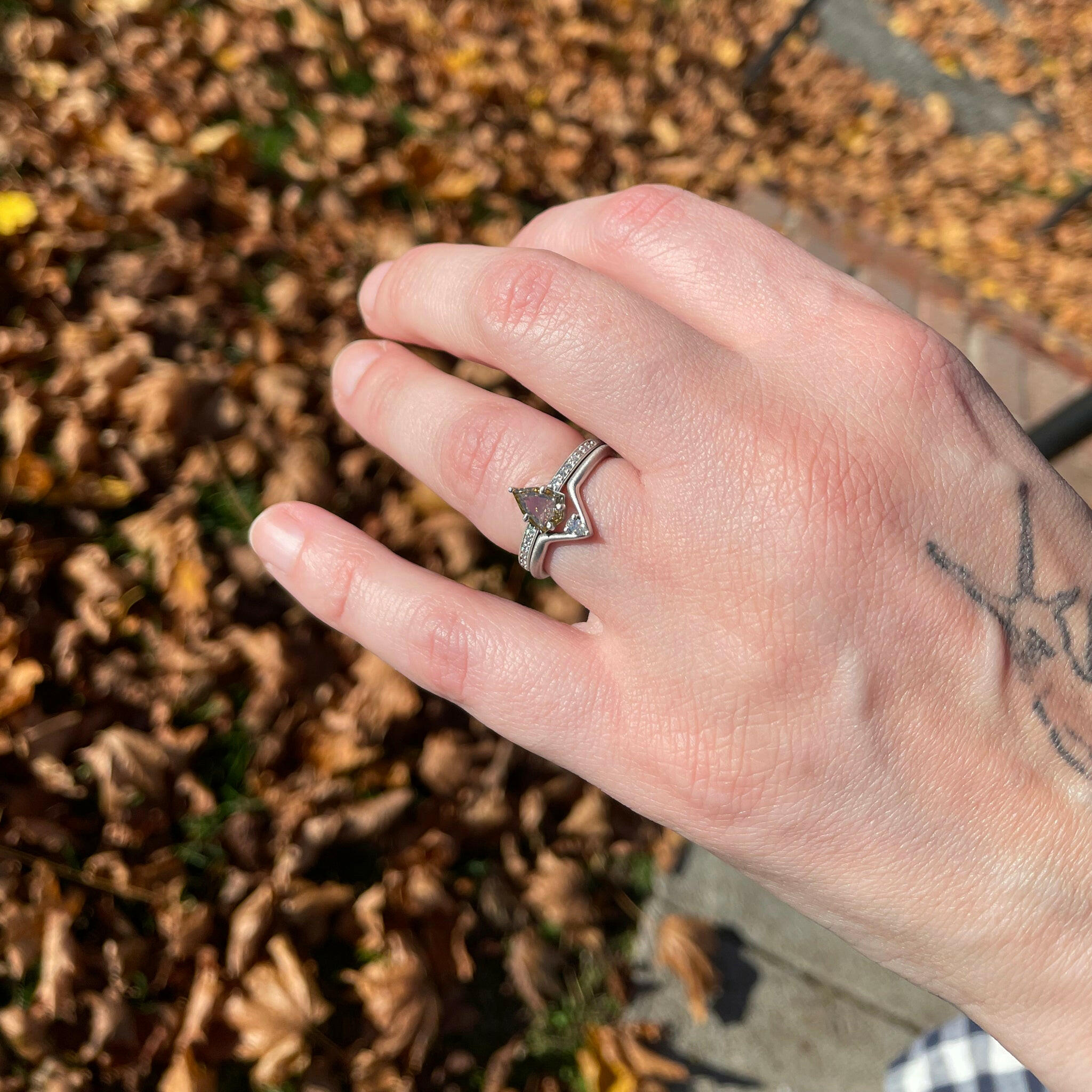 gold engagement ring with stacked chevron band