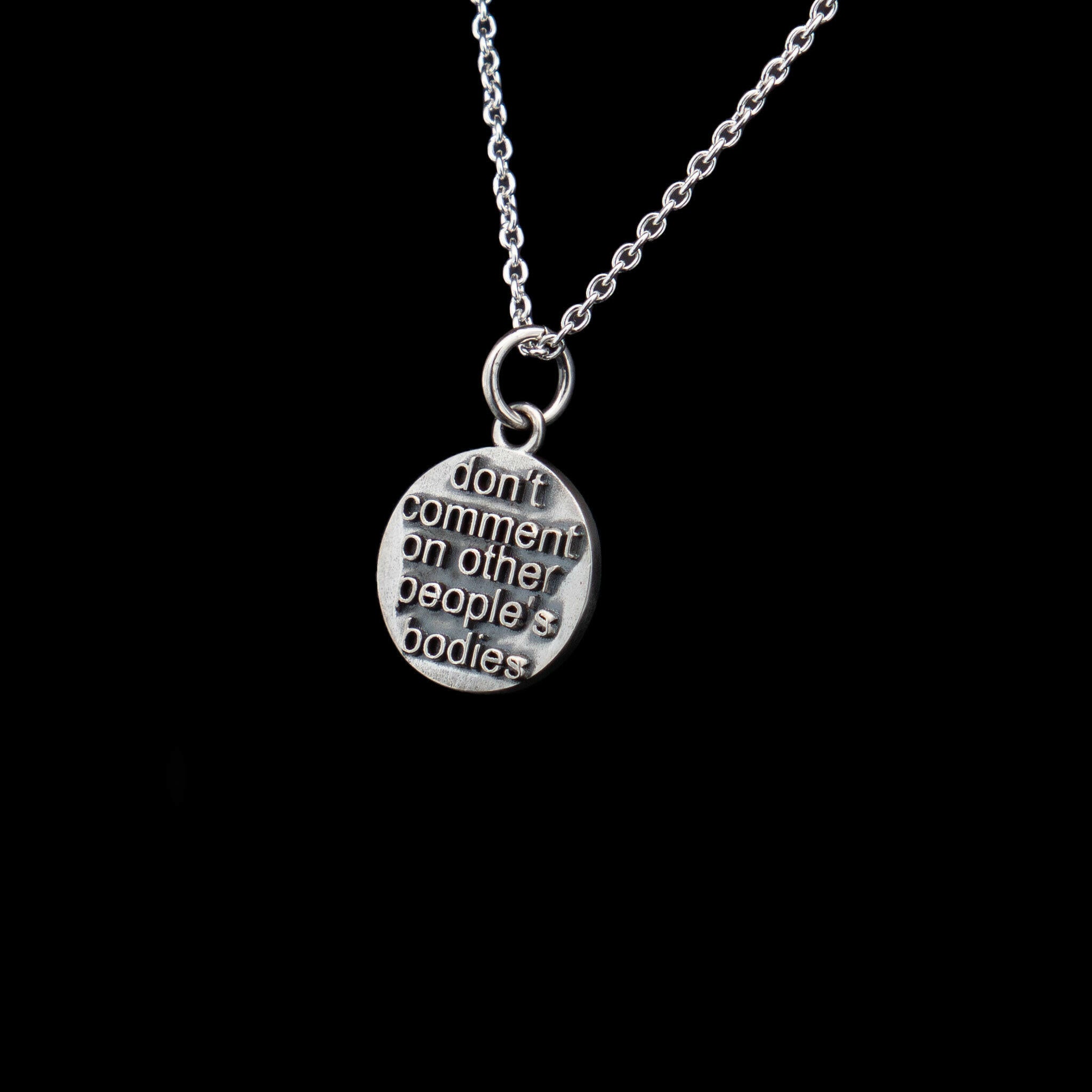 silver word pendant