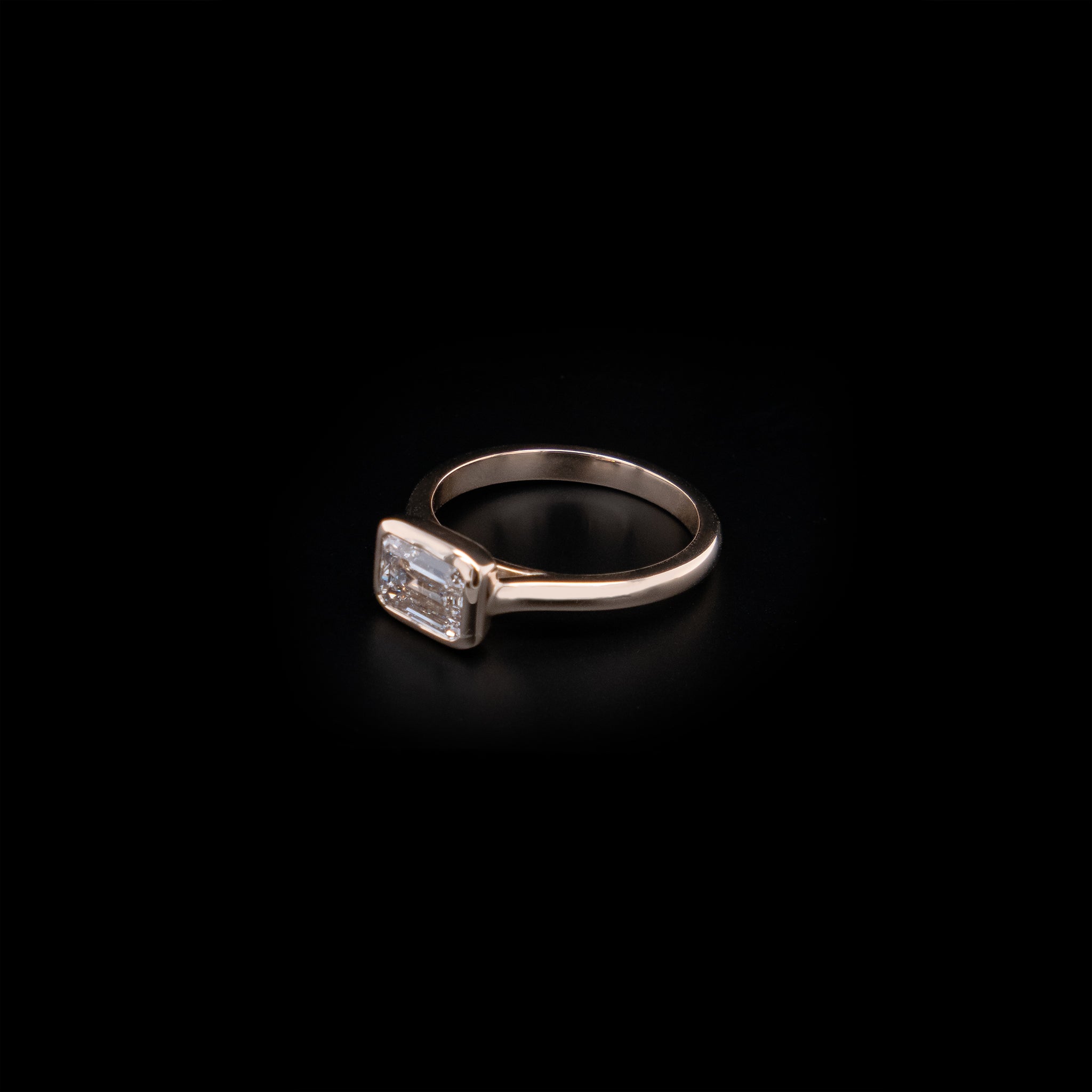 East-West Emerald Cut Diamond Ring