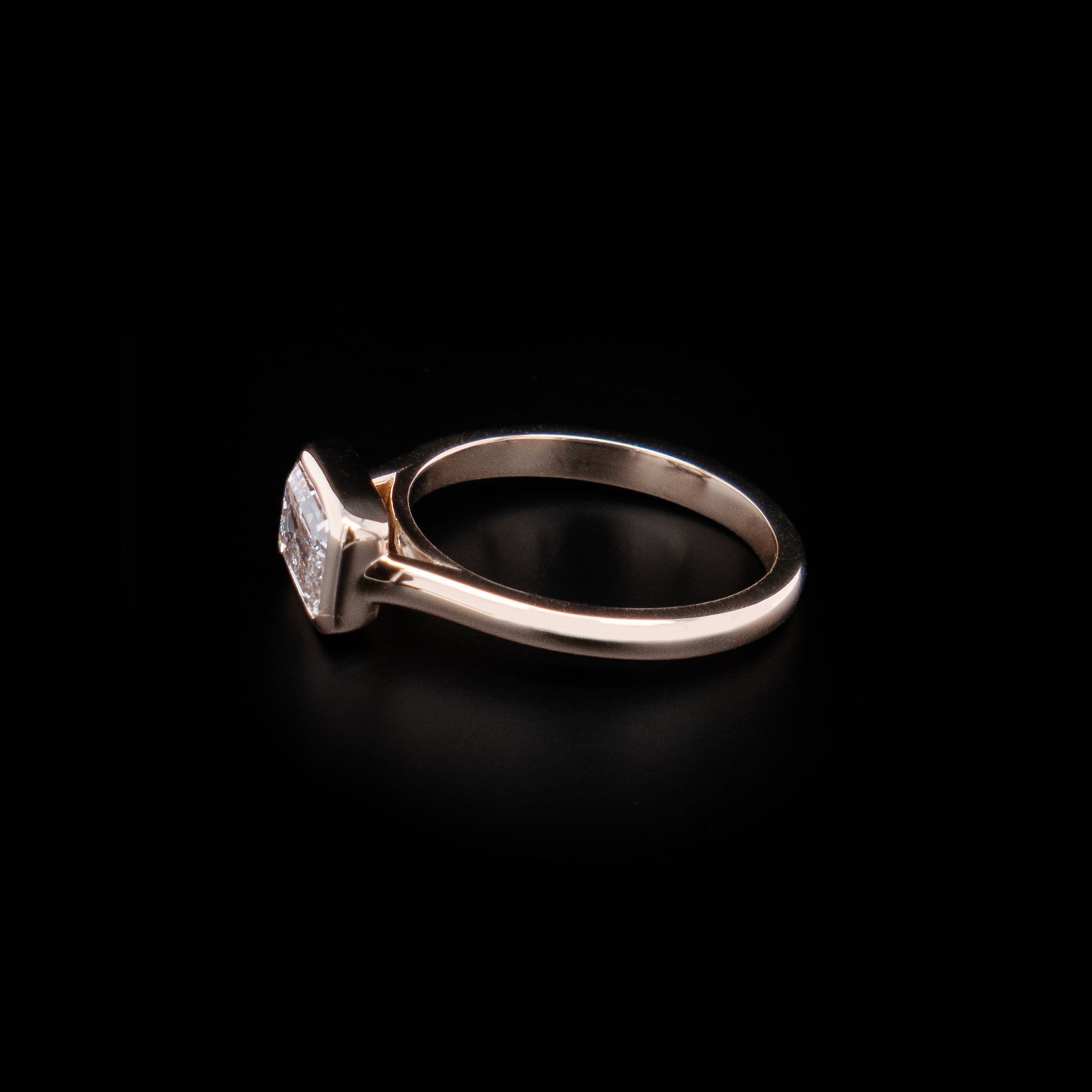East-West Emerald Cut Diamond Ring