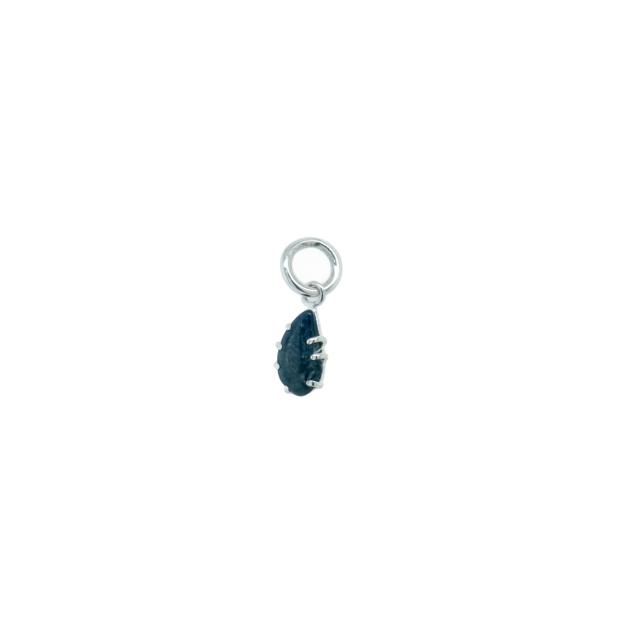 small dark blue carved sapphire pendant
