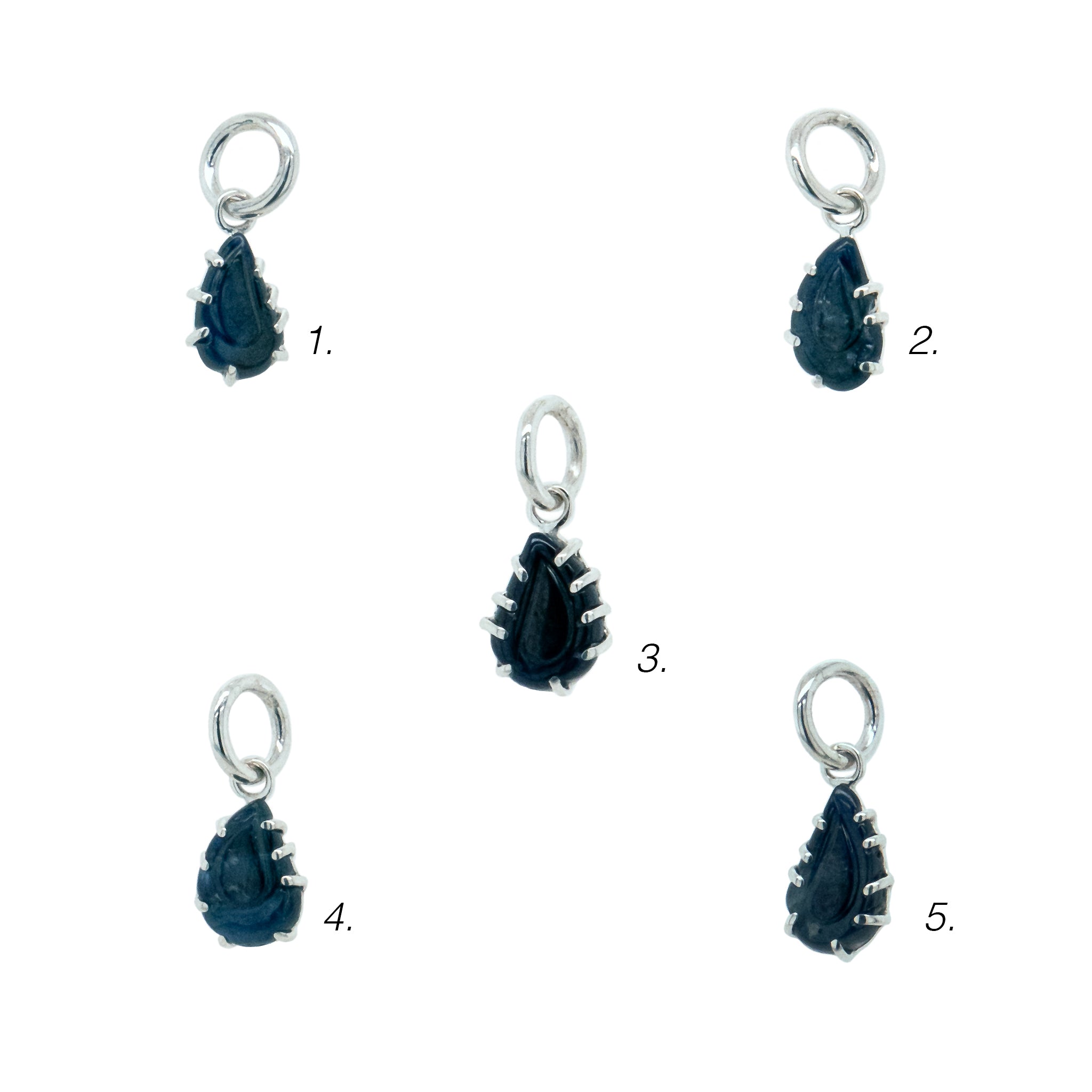 variety of carved sapphire pendants