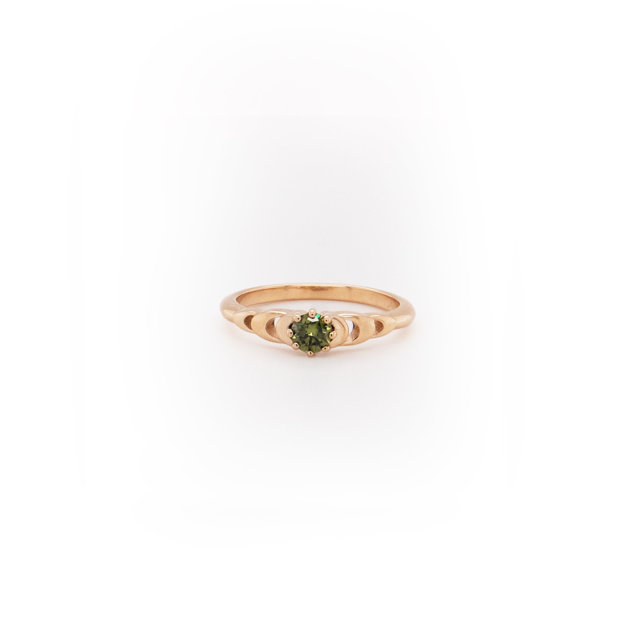 gold and green ring