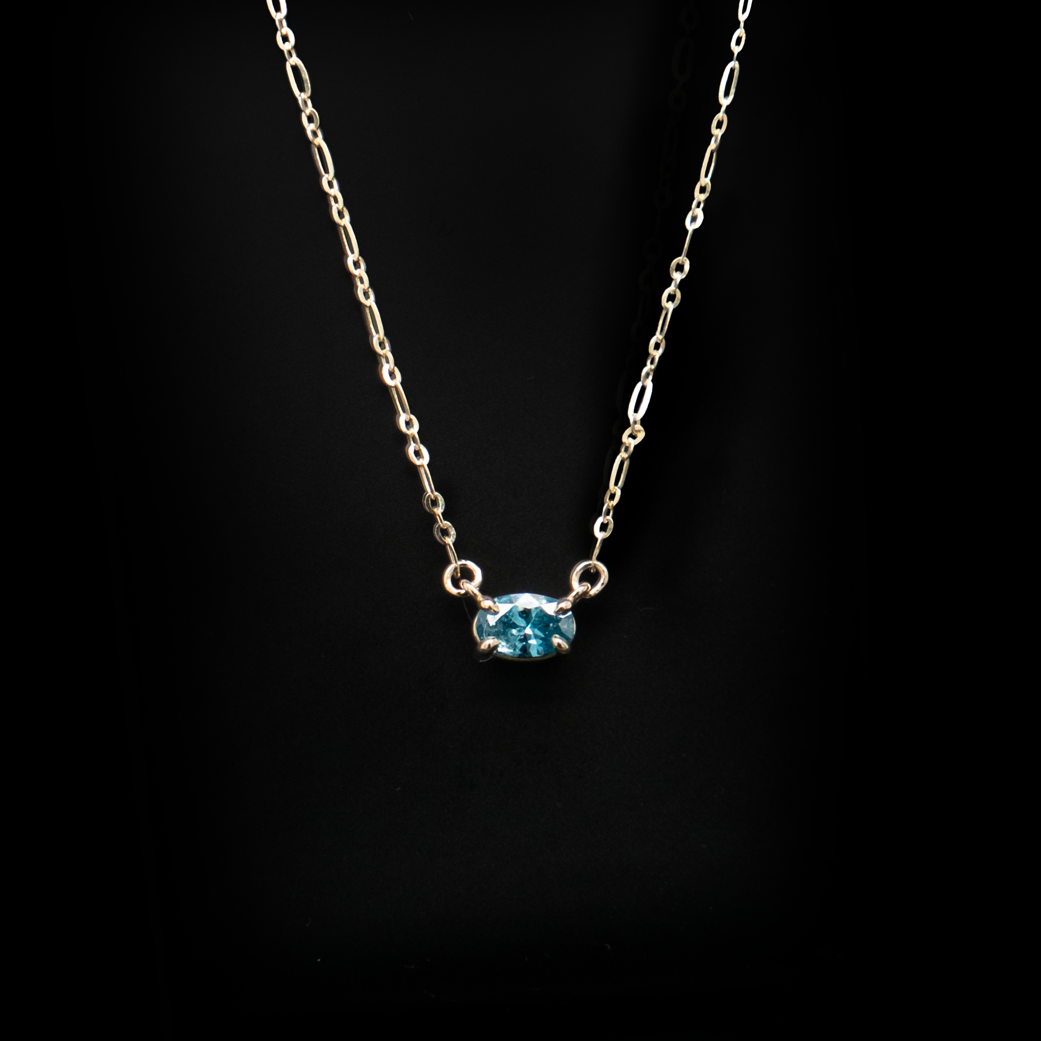 small oval blue diamond necklace