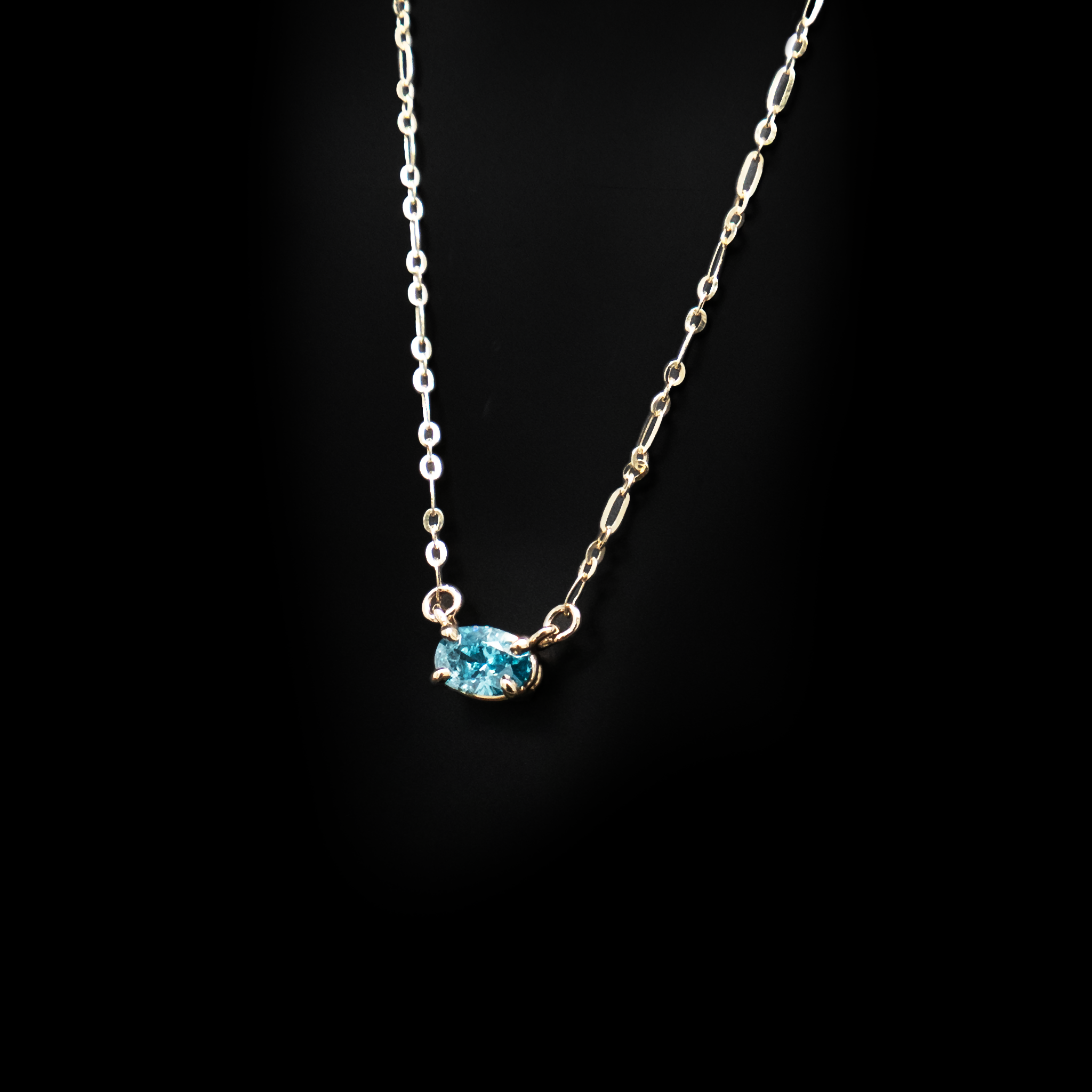 small oval blue diamond necklace