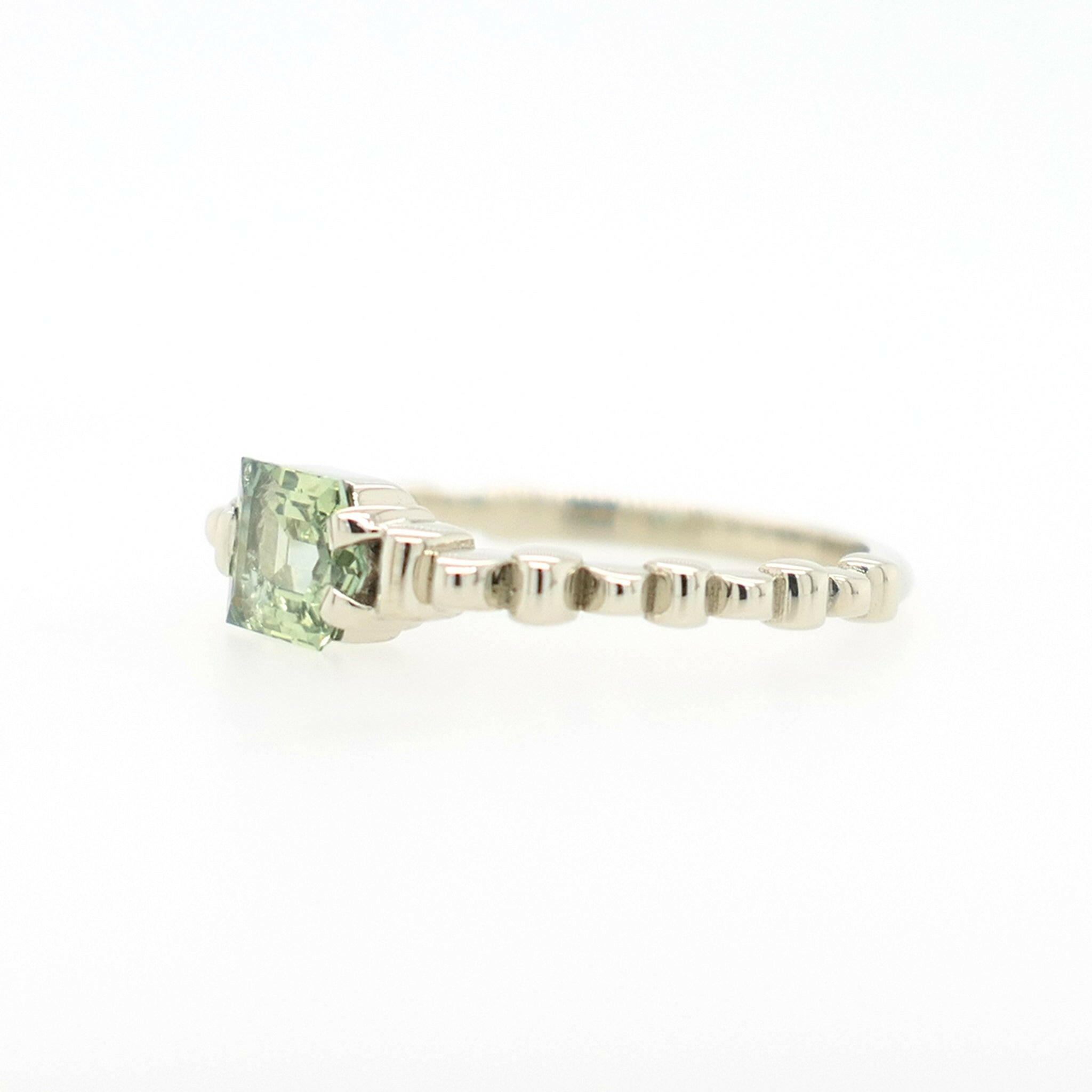 beautiful light green montana sapphire with textured ring