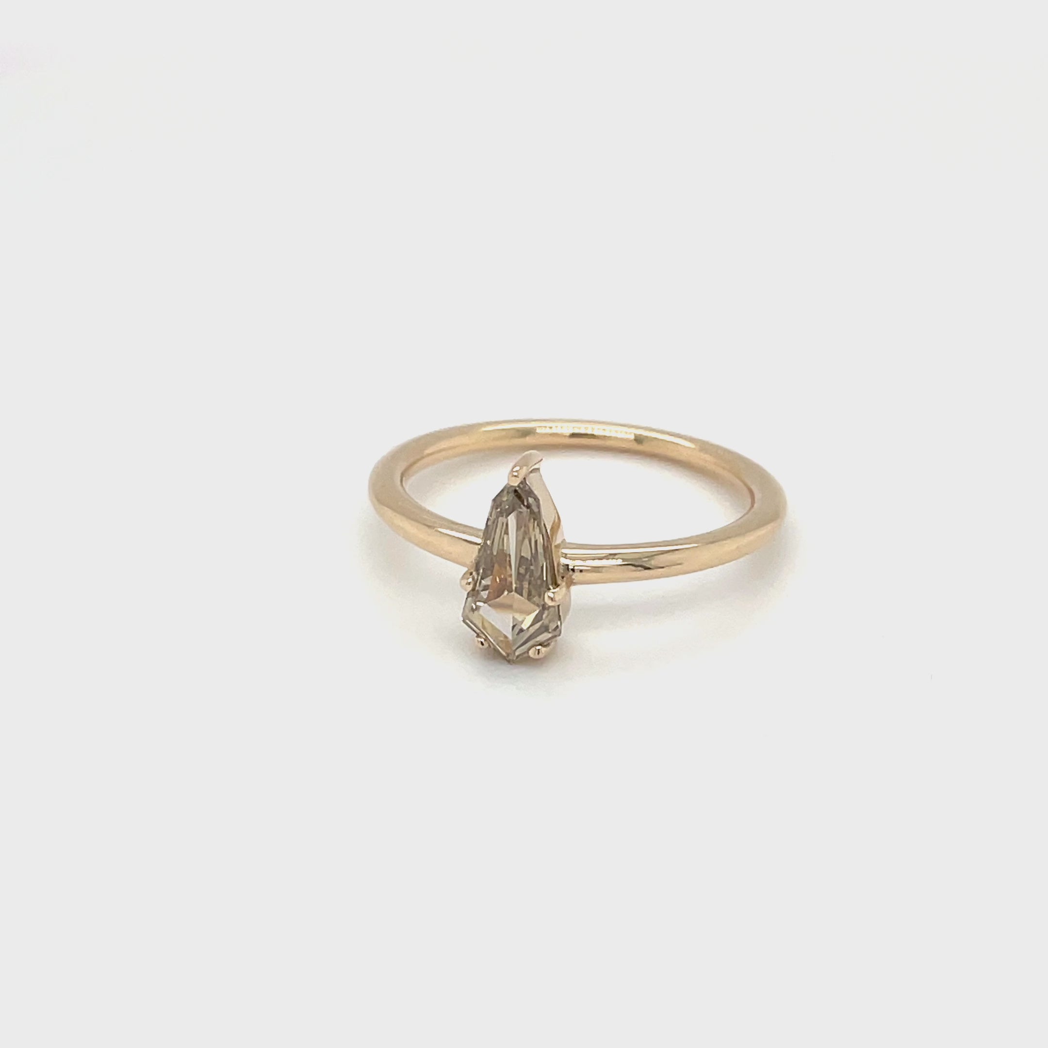 Kite shape rose cut champagne diamond in yellow gold with thin simple band