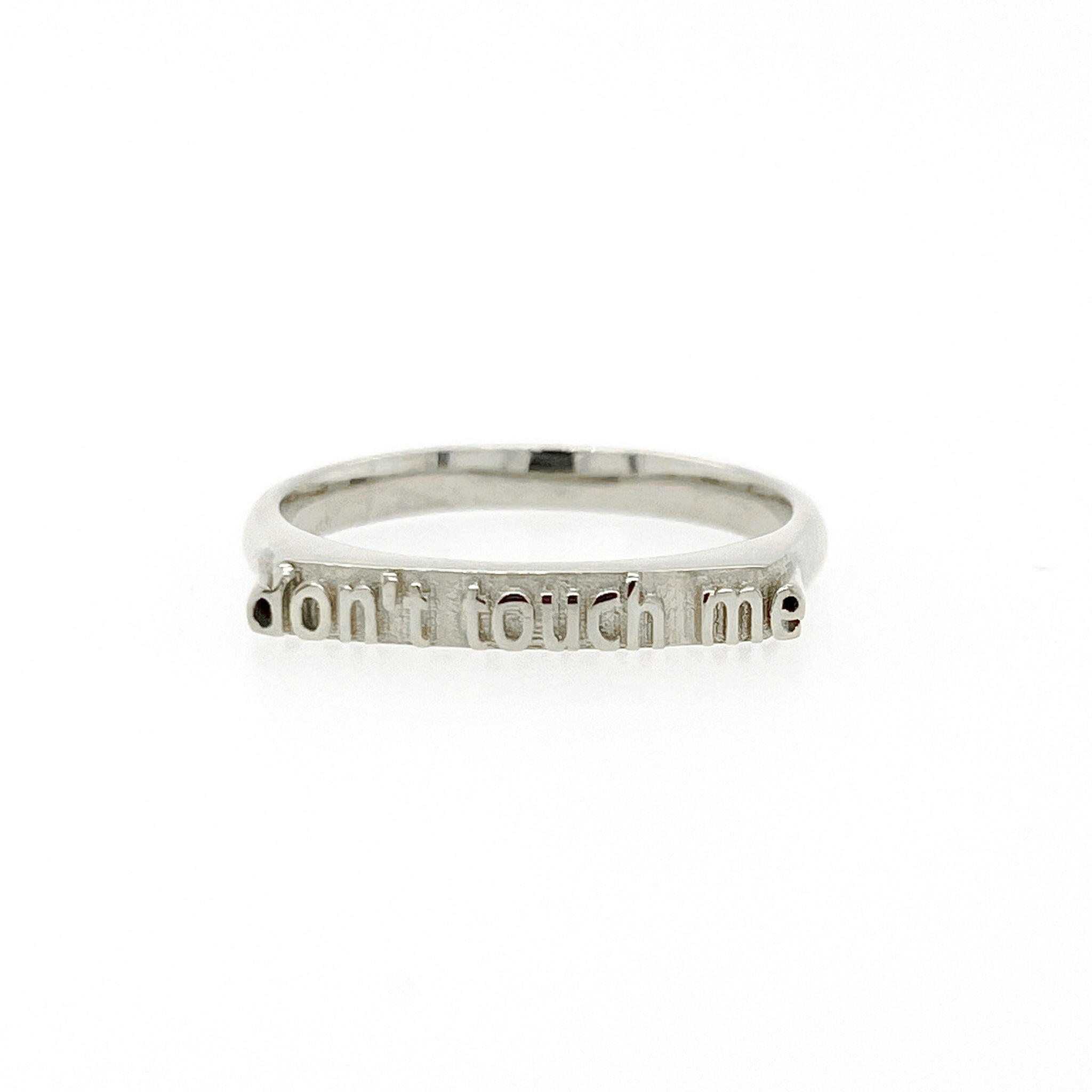 front view of 14k white gold ring with text that reads "don't touch me"